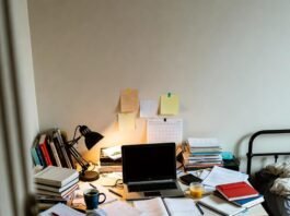 Top 10 Part-Time Jobs for College Students in 2025 Chaotic dorm desk with hustle and study mess