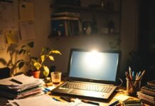 Best Internships That Lead to Full-Time Careers Cluttered 1 a.m. desk with laptop glare and chai glass