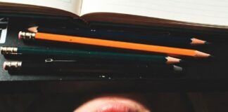 How to Study Smarter, Not Harder: A College Survival Guide Exhausted student under desk, tired eyes glowing, rock bottom vibe.